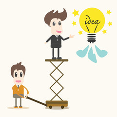 business man catching a light bulb