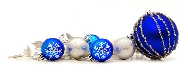 Collection of blue and silver Christmas baubles forming a border