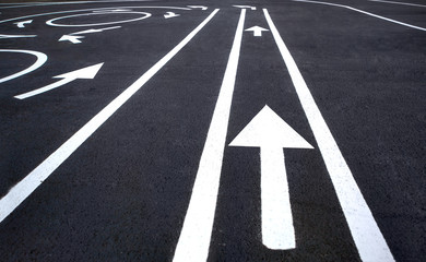 Arrow traffic on the asphalt road