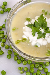 homemade pea soup with cream and parsley