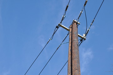 Wooden electric pole with power line