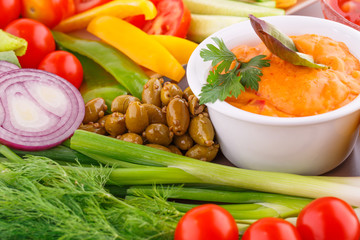 Vegetables, olives, nachos, red and cheese sause