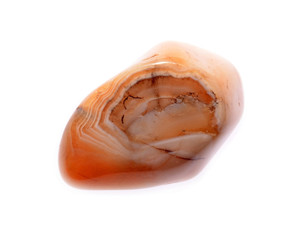Red agate geological crystal isolated .