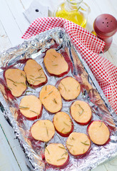 sweet potato with rosemary on the foil