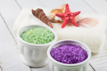 Sea salt in bowls on  wooden background