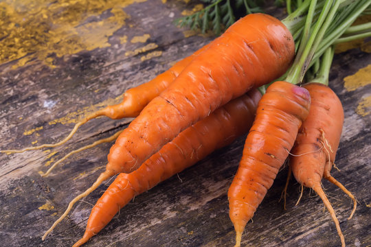 Fresh carrot on table