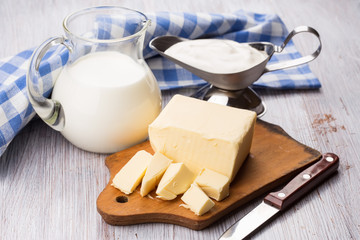 Fresh butter on wooden board.