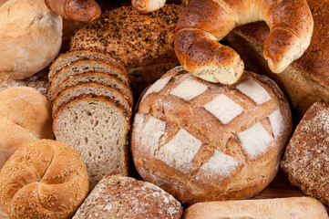 Group of different bread's type on wooden table