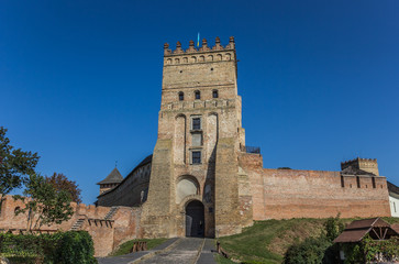 Fototapeta na wymiar Lutsk castle with the Ukrainian flag on top