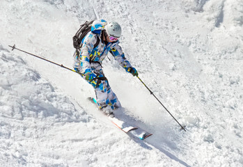 Skier on the bumpy slope