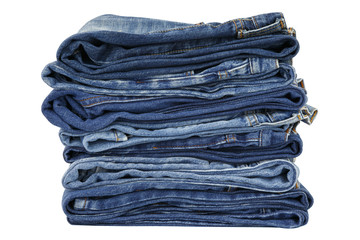 lot of blue jeans isolated on white background
