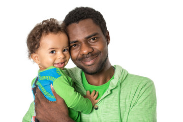 Happy black father and  baby boy cuddling on isolated