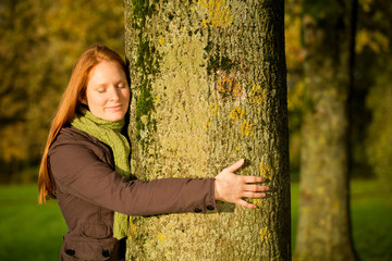 Woman Hugging a Tree