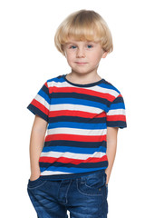 Joyful little boy in striped shirt