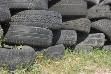 Obraz premium Pile of used old rubber tire