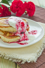 delicious pancakes with sour cream and jam