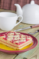cake on a plate and tea