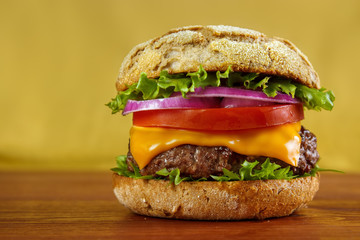 Multigrain bun hamburger on wooden table