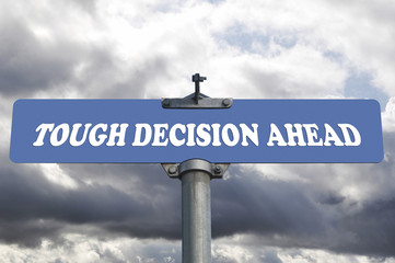 Tough decision ahead road sign