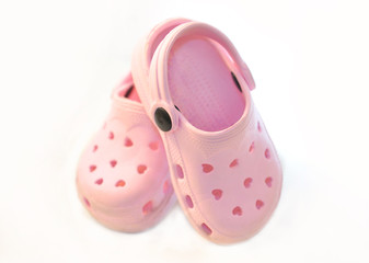 Baby pink rubber summer shoes.