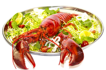 lobster on a plate with a lemon lime restaurant