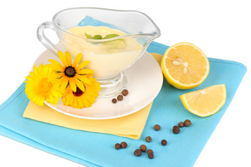 Mayonnaise in bowl on napkin isolated on white