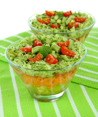 Tasty salad with fresh vegetables, isolated on white