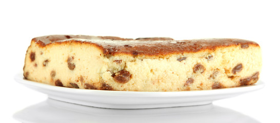 Cheese casserole with raisins on plate isolated on white