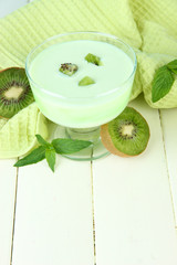 Delicious yogurt with fruit on table close-up
