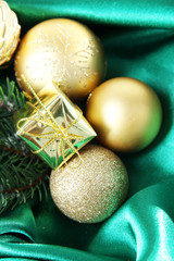 Beautiful Christmas decor on green satin cloth