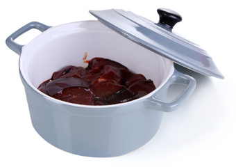 Raw liver in pan isolated on white