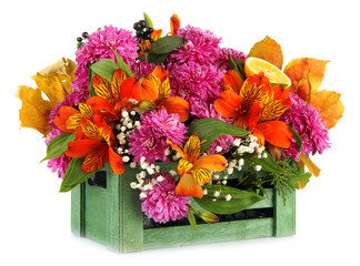 Flowers composition in crate isolated on white