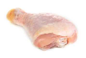 Raw chicken leg isolated on white