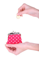 Female hand holding pink purse isolated on white