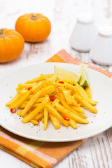 roasted pumpkin with lime and chilli on the plate