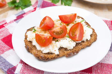 sandwich with homemade cottage cheese, pepper, herbs and cherry