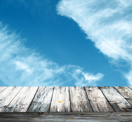 Clear blue sky and wooden floor