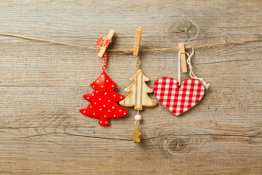 Christmas decoration toys hanging on string - Powered by Adobe