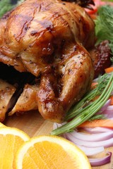 Whole roasted chicken with fresh vegetables