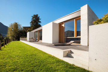 Exterior modern house in cement, view from garden