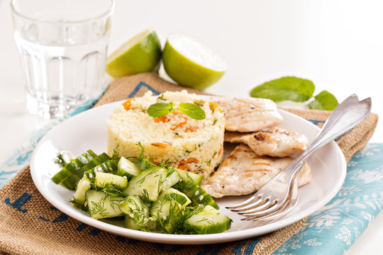 Grilled chicken with couscous and salad