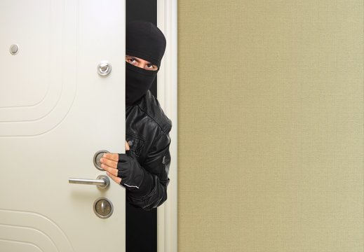 Masked Thief At The Entrance Door