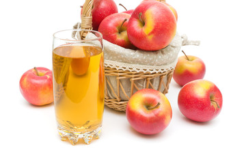 red apples and glass of juice on a white background