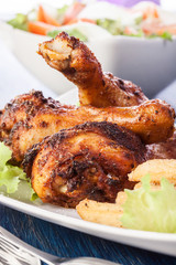 Chicken drumsticks with prepared potatoes