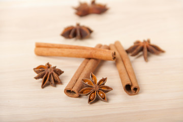 cinnamon and star anise on wooden background