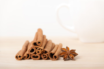 cinnamon and star anise on wooden background
