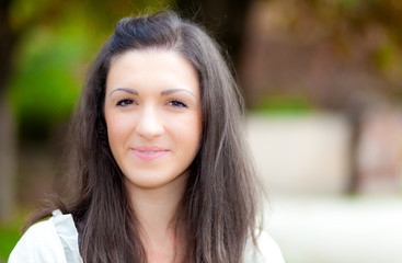 Fototapeta premium Smiling woman at the park
