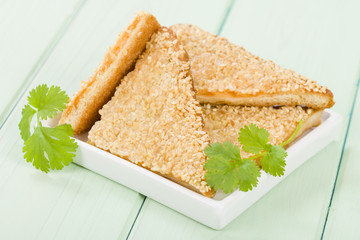 Prawn Toast - Chinese bread with minced shrimp and sesame © paul_brighton