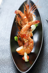 Pan fried tiger prawn with curl cucumber