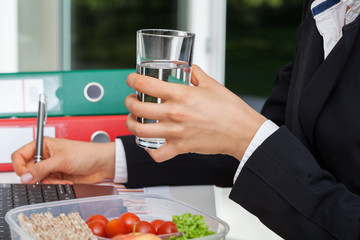 Glass of water during the work